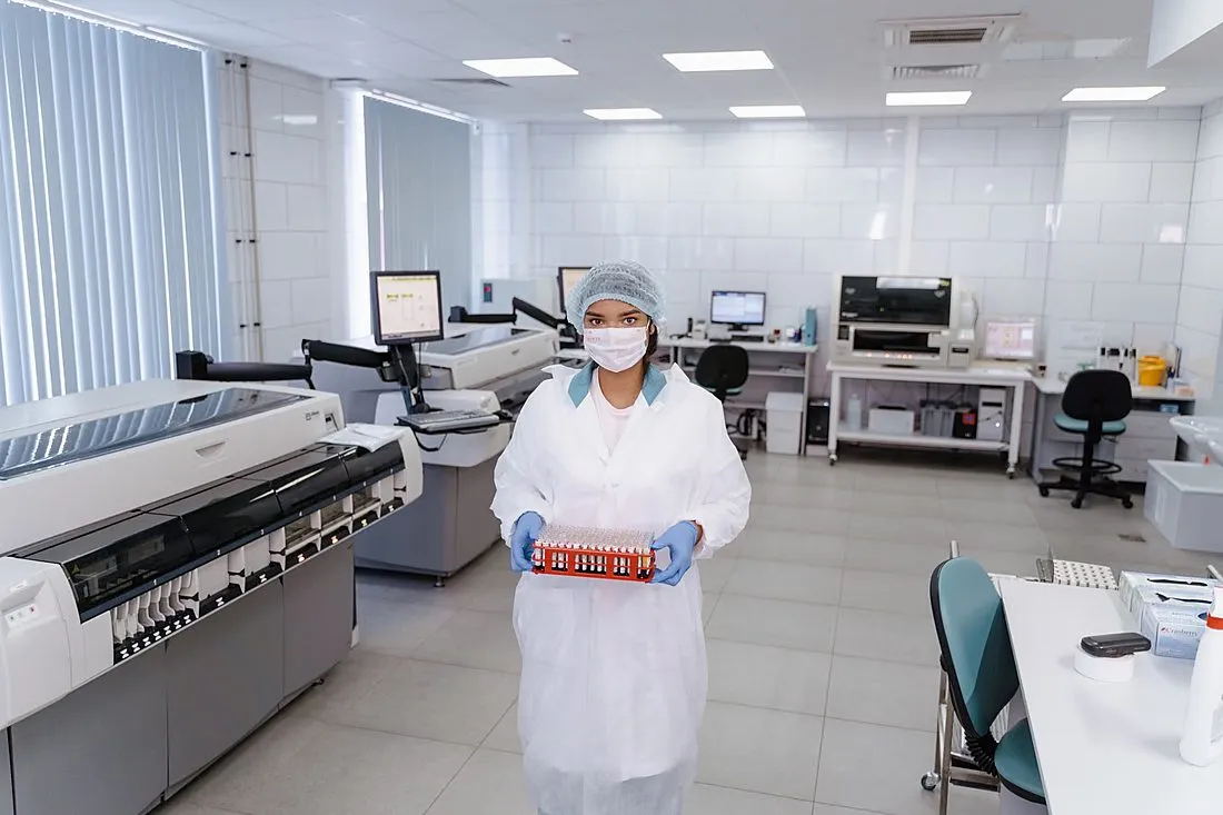 a genetics researcher at a lab computer