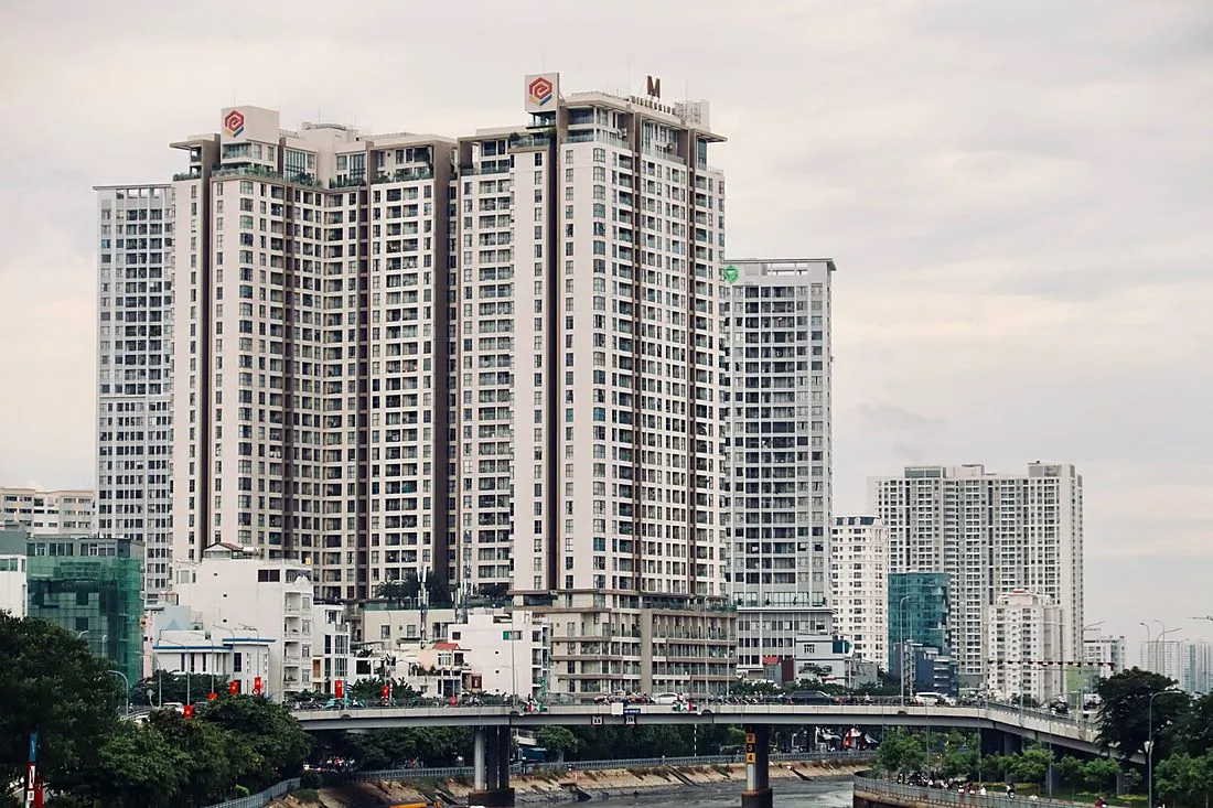 a newly built apartment tower in a city skyline