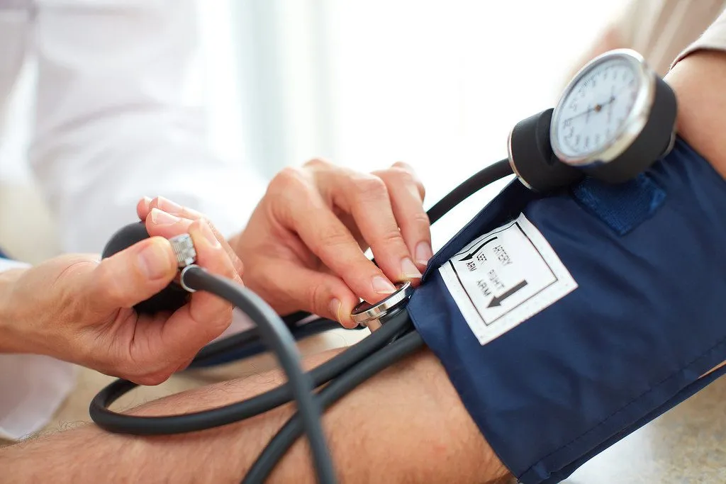 cardiologist with elderly patient