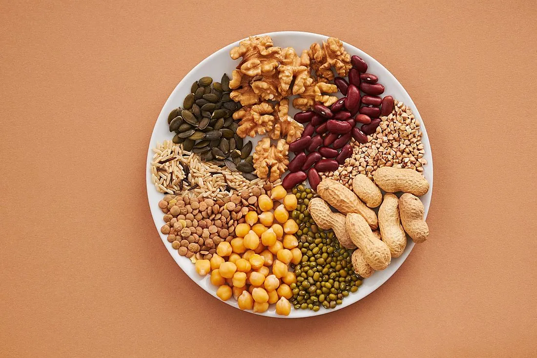 a plate of colorful vegetables, whole grains and legumes
