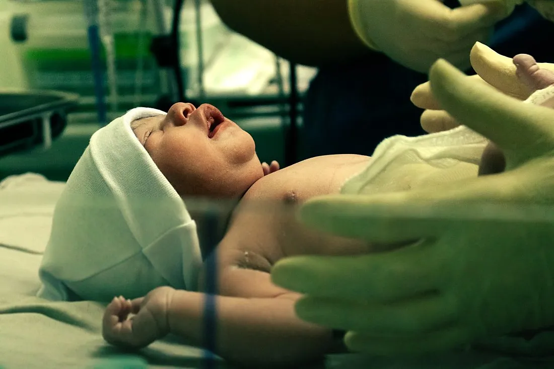 a newborn baby in a hospital