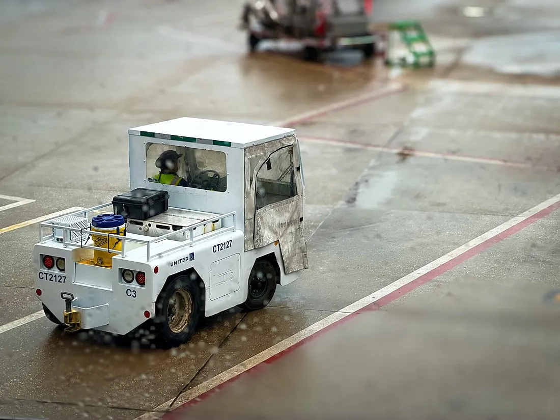 an airport ramp worker on the tarmac