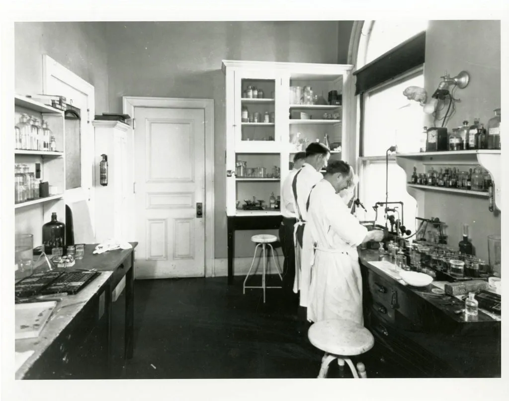 scientists working in a biology research laboratory